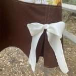 sunflower 20s apron-kick-pleat detail